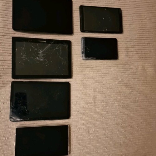 Various tablets used with damages for spare parts