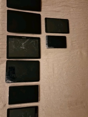 Various tablets used with damages for spare parts