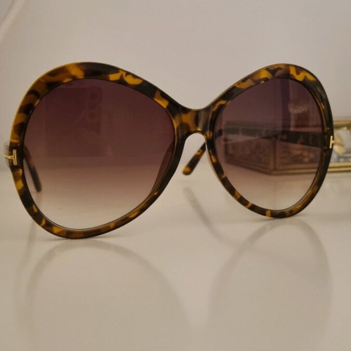Sunglasses like new, brown-black with gold detail, oversized