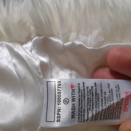 Polyester fur 100% like new for 9 to 10 years old