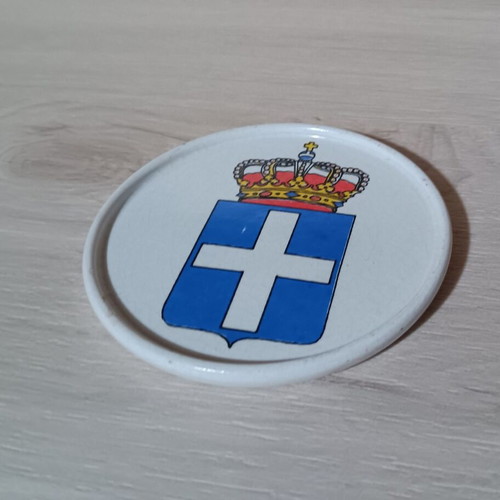 Ceramic coaster with royal emblem like new, diameter 8.5 cm
