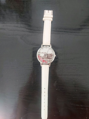 White women's wristwatch used from Amsterdam with minor strap defect
