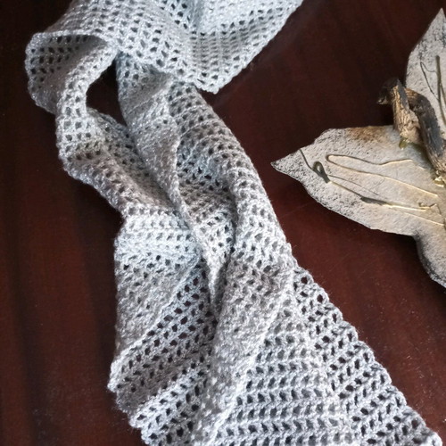 Handmade silver knitted scarf new with subtle shine