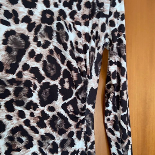 Animal print leopard dress like new with ruching and long sleeve