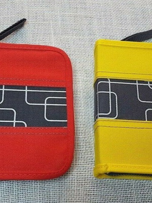 CD/DVD cases used, pack of 2, 20 slots each with zipper yellow and red