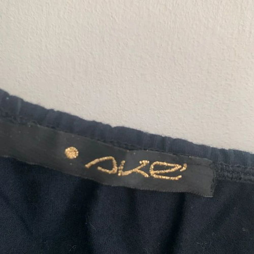 Top M Ake' black and gold used with lace detail