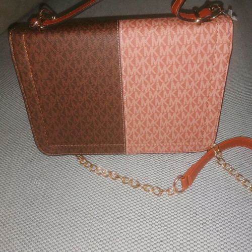Shoulder bag used with strap for shoulder and hand