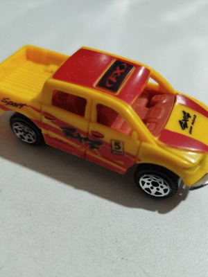 Yellow toy car used