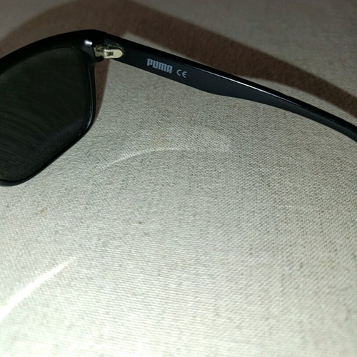 Puma sunglasses like new, black