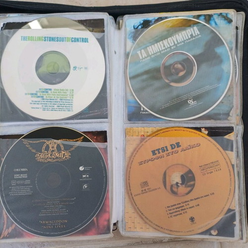 CD singles used, pack of 24 assorted