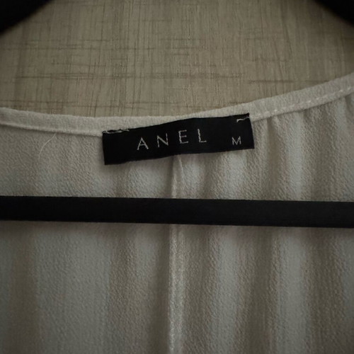 White asymmetrical blouse Anel size M like new