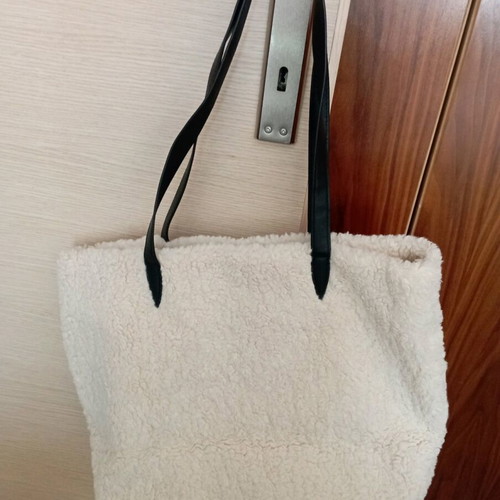 Shoulder bag with furry fabric
