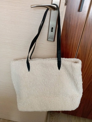Shoulder bag with furry fabric