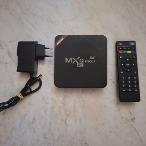 Android TV Box MXQ Pro 4K 5G used with remote and power adapter