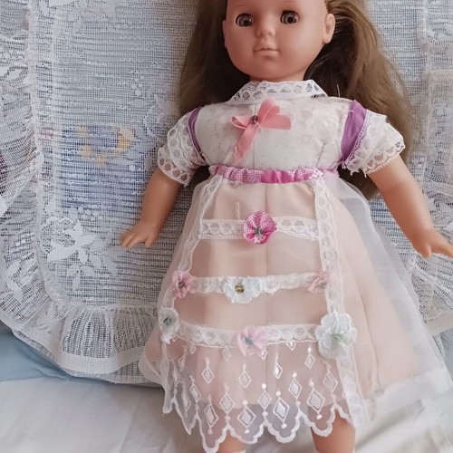 Vintage doll with unique handmade clothes like new