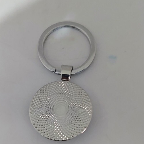 Metal keychain like new with green radar screen design