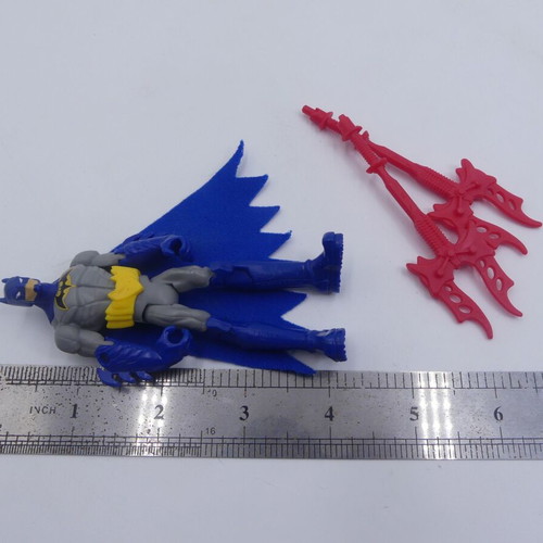 Batman Gotham City Showdown action figure used with 2 red weapons