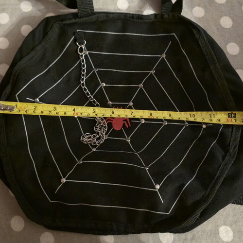 Spiderweb shoulder bag like new, black and red, 77cm strap