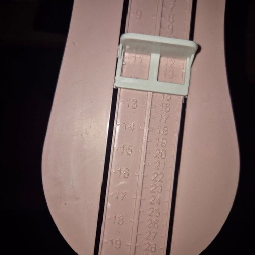 Children's Foot Measuring Device new, pink plastic