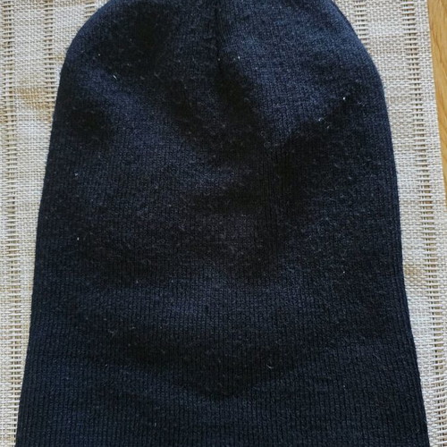 Knitted black beanie hat new, one size
