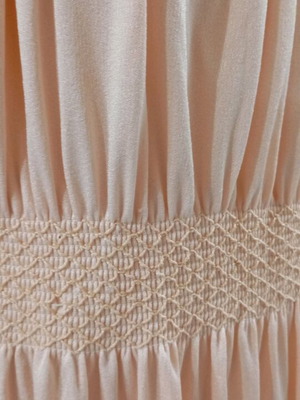 Vintage 70s dress made of elastic acrylic fabric light salmon, like new