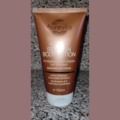 Self Tan body lotion used with vitamin E and almond extract