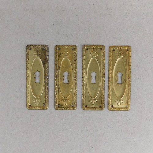Decorative brass covers for furniture locks