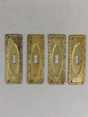 Decorative brass covers for furniture locks