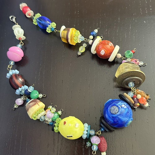 Handmade necklace with colorful beads and unique elements new