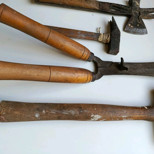 Set of old handmade tools used with wooden handles