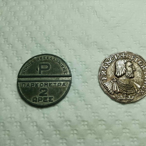 Collectible tokens used, Thessaloniki parking 1980 and BP gasoline 1960