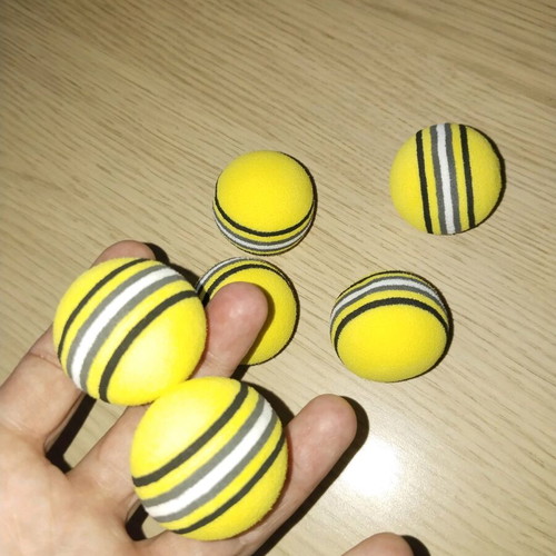 Set of yellow cat toy balls new