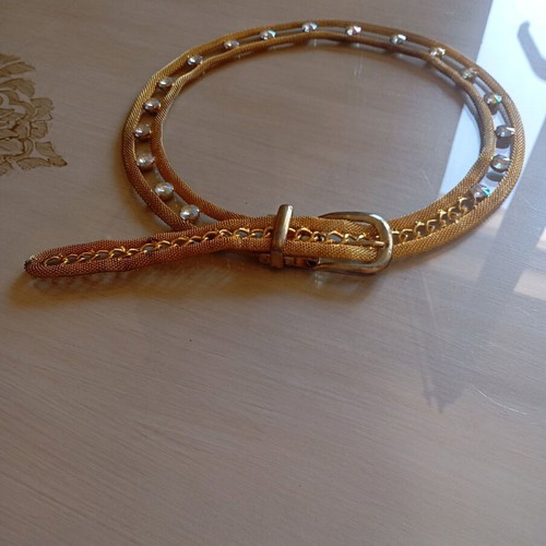 Adjustable metal belt like new with rhinestones gold color