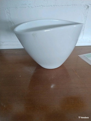 White flowerpot with unique opening