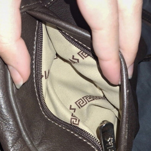 Dias leather bag used brown backpack