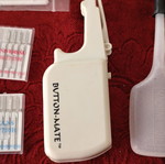 Sewing Machine Accessories Set like new with Needles, Button-Mate Tool & Oil