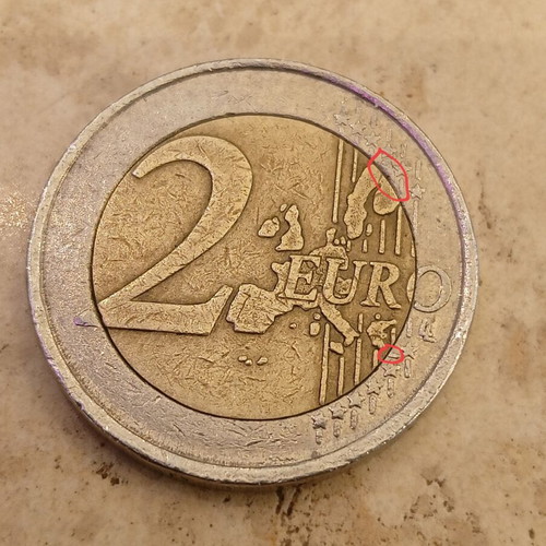 2 Euro Portugal 2002 coin used with printing errors