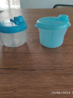 Two baby milk powder scoops used, Philips Avent and Jumbo