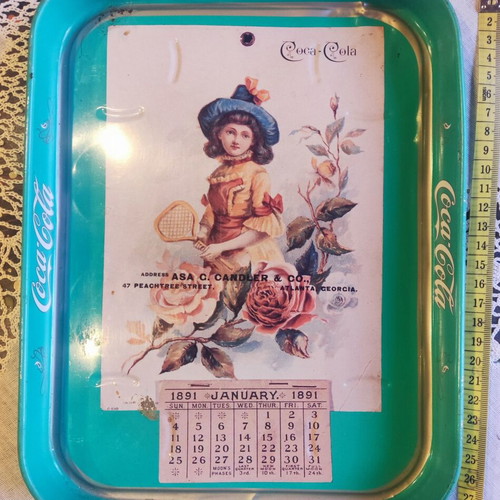 Vintage Coca-Cola metal serving tray used with 1891 calendar design