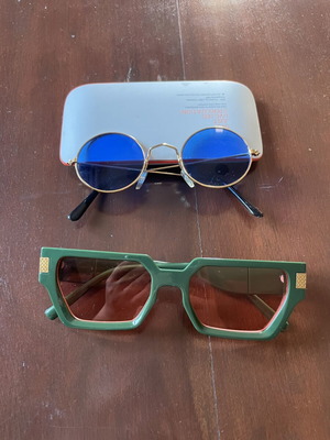 Set of green sunglasses with croco texture and round carnival glasses