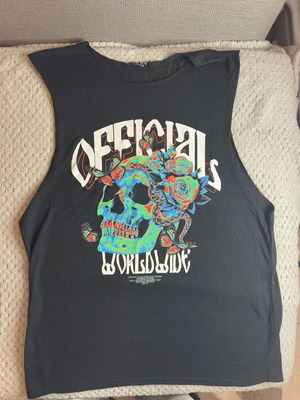 Officials Worldwide sleeveless top with colorful skull print, like new, black