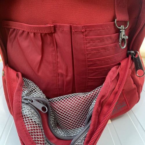 Champion backpack red, like new, large capacity with multiple compartments
