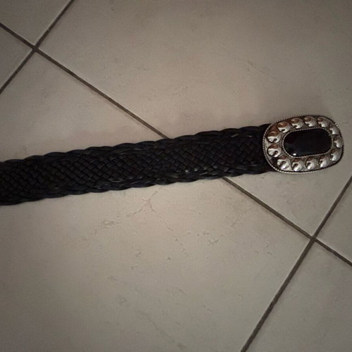 Black knitted belt like new with silver buckle and black stone