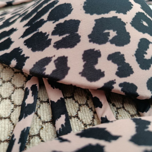 Leopard print swimsuit S-M like new with cut bottom and good chest lining