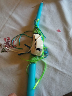 Candle from To Hamogelo Tou Paidiou new with small mark
