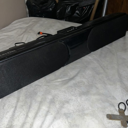 Crystal Acoustics soundbar used with AirPod and iPhone dock