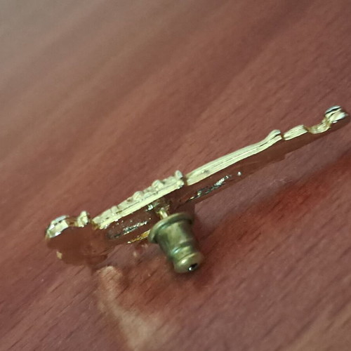 Vintage metal lapel pin pen design with rhinestones like new, gold tone