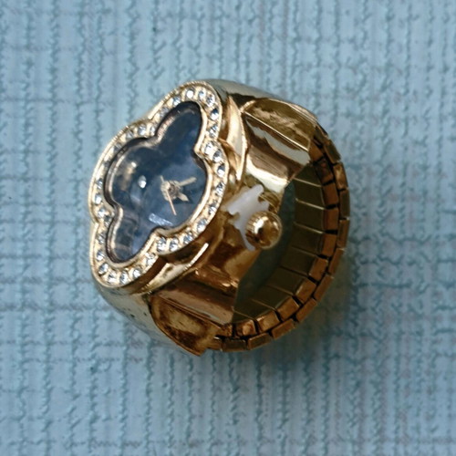 Four-leaf ring like new with quartz watch, blue dial and crystals