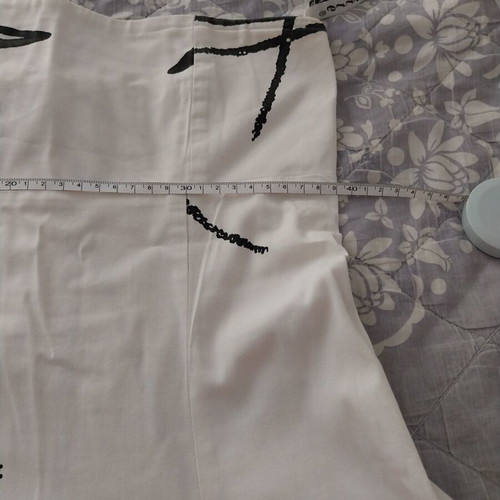 Strapless dress used, white with black abstract design, flattering waist
