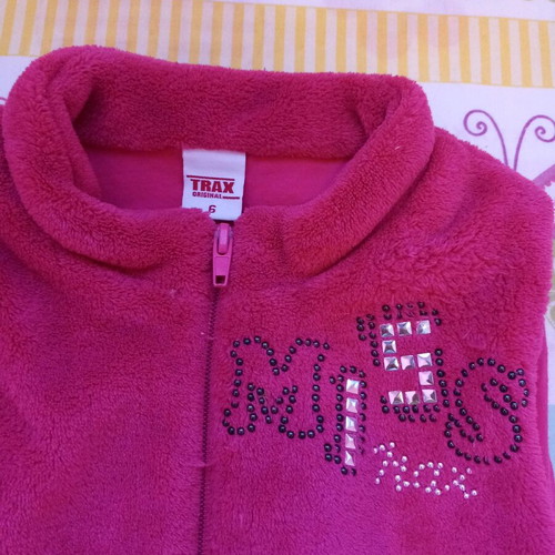 Pink sleeveless vest like new for ages 5-6